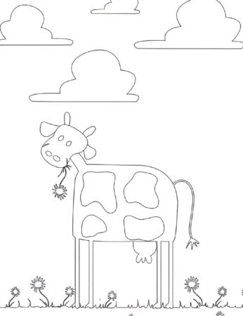 Happy cow in field surrounded by dandelions